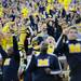 Michigan fans celebrate after Brendan Gibbons kicked a field goal to tie the game late in the fourth quarter against Northwestern at Michigan Stadium on Saturday. Melanie Maxwell I AnnArbor.com